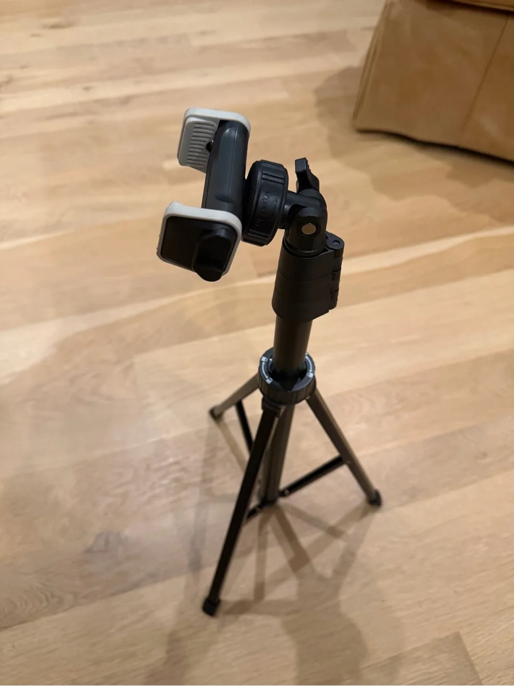 Compact Black Smartphone Tripod with Adjustable Phone Mount